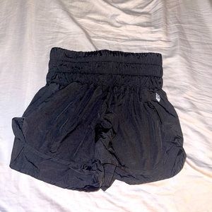 Free People Movement high waisted shorts size medium. Look brand new